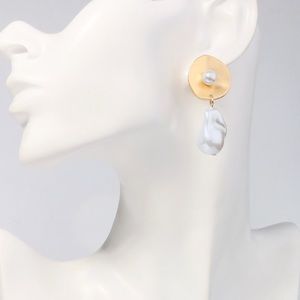 Large pearl earrings